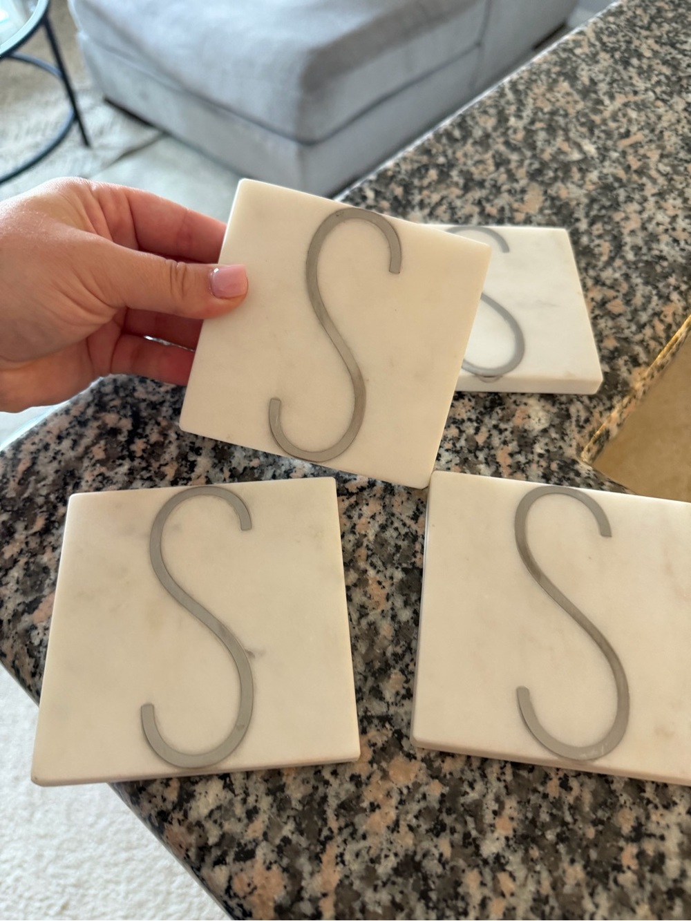 Crate&Barrel White Marble Coaster Set with Silver 'S' Inlay